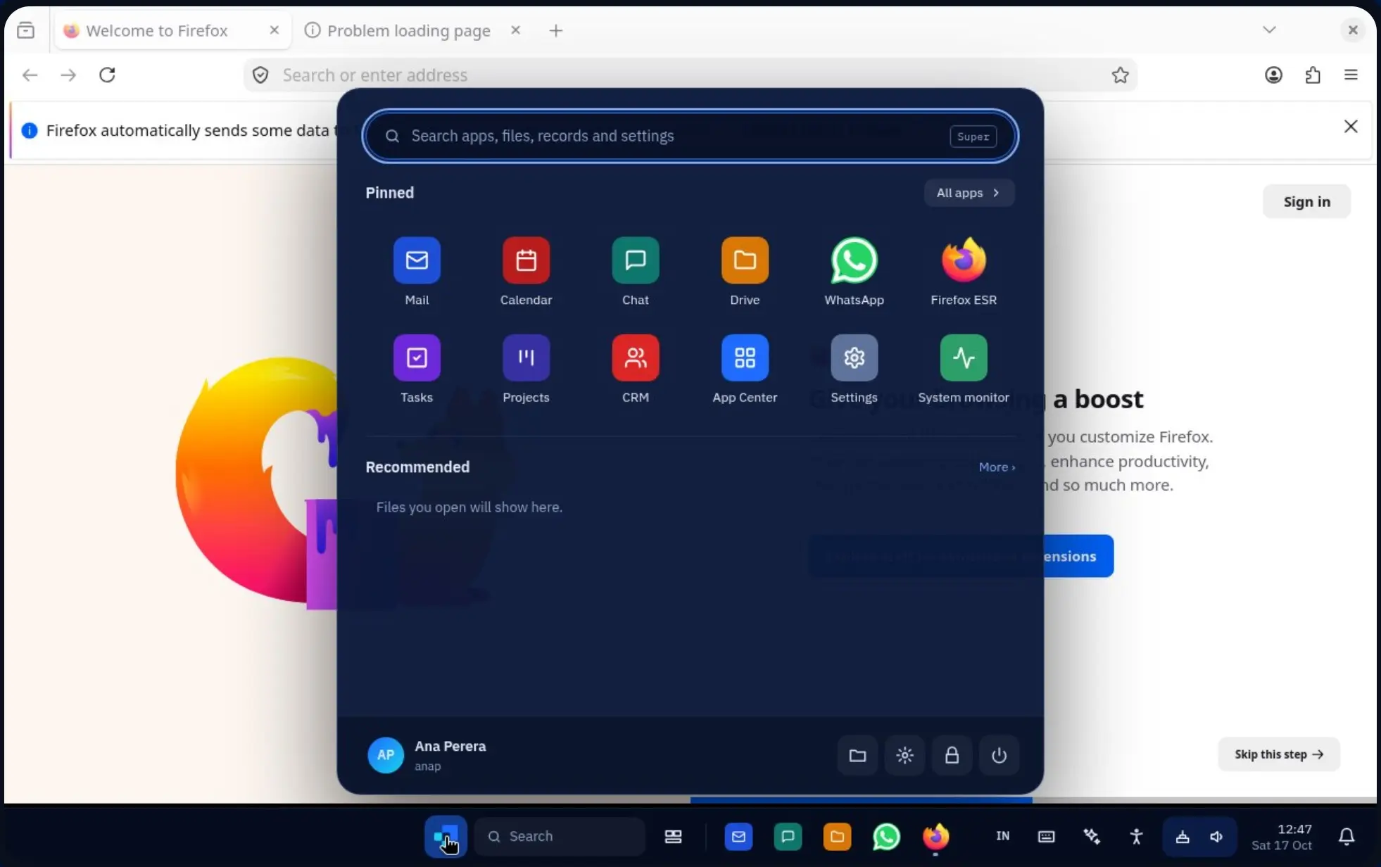 WorkSuite OS desktop with Start open, showing pinned Mail, Calendar, Chat, Drive, WhatsApp, Firefox ESR, Tasks, Projects, CRM, App Center, Settings and System monitor, over a Firefox window